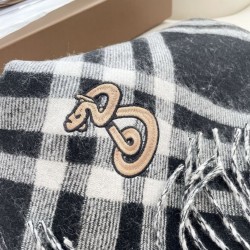 Replica Sciarpa in cashmere con motivo check Burberry e orlo con nappe Nero/bianca 30 x 168 Imitazioni Replica qualità specchio Sciarpa in cashmere con motivo check Burberry e orlo con nappe Nero/bianca 30 x 168