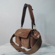 Borsa a tracolla media Prada Explore con patta scamosciata Marrone