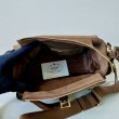 Borsa a tracolla media Prada Explore con patta scamosciata Marrone