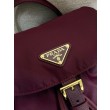 Zaino Prada medio Re-Nylon con marsupio 1BZ811 Borgogna