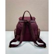 Zaino Prada medio Re-Nylon con marsupio 1BZ811 Borgogna