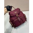 Zaino Prada medio Re-Nylon con marsupio 1BZ811 Borgogna