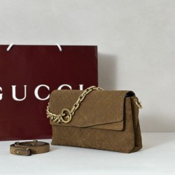 Replica qualità specchio Borsa a tracolla Gucci media con motivo GG goffrato e catena 857622 scamosciata marrone