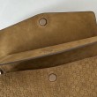 Borsa a tracolla Gucci media con motivo GG goffrato e catena 857622 scamosciata marrone