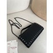 Portafoglio con catena Valentino Garavani Rockstud Nero