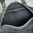 Borsa da viaggio piccola Gucci GG Emblem da uomo 855789 Nero