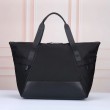 Borsa tote Prada Re-Nylon con finiture in pelle nera