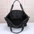 Borsa tote Prada Re-Nylon con finiture in pelle nera