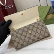 Portafoglio Gucci GG Marmont bicolore con catena 546585 marrone/Bianco