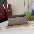 Portafoglio Gucci GG Marmont bicolore con catena 546585 marrone/nero