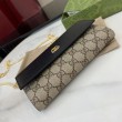 Portafoglio Gucci GG Marmont bicolore con catena 546585 marrone/nero