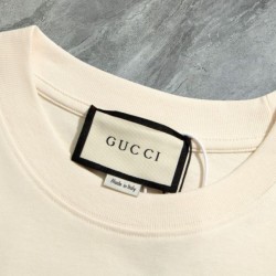 Replica di lusso Maglietta girocollo Gucci unisex nera/albicocca 09 Imitazioni Cloni Maglietta girocollo Gucci unisex nera/albicocca 09 firmate