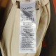 Cloni Giacca Gucci con cappuccio e tasca con cerniera ricamata firmate