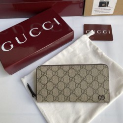 Cloni Pari all'originale replica di alta qualit&agrave; Portafoglio Gucci con cerniera interna GG 856562 Marrone firmate