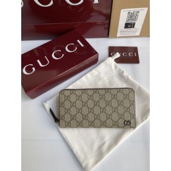 Pari all'originale replica di alta qualit&agrave; Portafoglio Gucci con cerniera interna GG 856562 Marrone