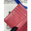 Portacarte Lady Dior con patta e l'iconica impuntura Cannage Rossa
