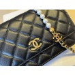 Portafoglio Chanel trapuntato in caviale perlato con catena Woc Nero