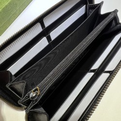 Portafoglio Gucci GG Marmont trapuntato con cerniera 443123 nero