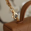 Chanel 26P Beauty case sottile con manico superiore trapuntato e catena AP5100 Marrone