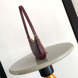 Replica di lusso Borsa Louis Vuitton Pochette Louis Vuitton Bloom M25650 Borgogna Imitazioni Cloni Borsa Louis Vuitton Pochette Louis Vuitton Bloom M25650 Borgogna firmate