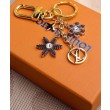 Alta gamma replica LV Snowflakes Borse Charm e portachiavi M80240 d'oro