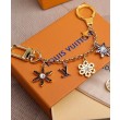 Alta gamma replica LV Snowflakes Borse Charm e portachiavi M80240 d'oro