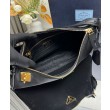 Borsa a tracolla grande Prada Aimee Re-Nylon con lucchetto 1BC232 Nero