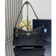 Borsa a tracolla grande Prada Aimee Re-Nylon con lucchetto 1BC232 Nero