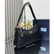 Borsa a tracolla grande Prada Aimee Re-Nylon con lucchetto 1BC232 Nero