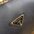 Borsa a tracolla Prada con logo triangolare nero