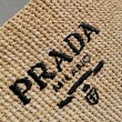 Borsa tote grande Prada all'uncinetto in filato effetto rafia beige