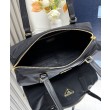 fedele Imitazioni borse griffate media Prada Re-Nylon con manico superiore e lucchetto 1BB127 Nero
