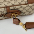 Gucci 821149 Borsa a tracolla media GG Emblem Marrone