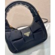 Mini-bag in nylon/nappa Prada Re-Nylon con fiocco 1BC241 Nero