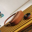 Prada Arque Shoulder Bag con Flap Brown
