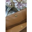 Borsa a secchiello Dior Signature piccola/media marrone Imitazioni