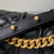 Borsa Chanel Boy Flap Classic A67086 in pelle di vitello martellata con finiture in oro opaco nera