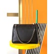 Borsa media Saint Laurent Niki a catena agnello martellata nera