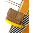 Borse Replica media Saint Laurent Niki a catena agnello martellata sughero scuro