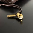 Pochette Andiamo di Bottega Veneta con manico agnello intrecciata fondente