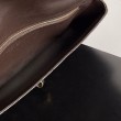 Pochette Andiamo di Bottega Veneta con manico agnello intrecciata fondente