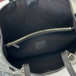 Borsa a tracolla piccola Gucci GG Emblem 847281 Marrone