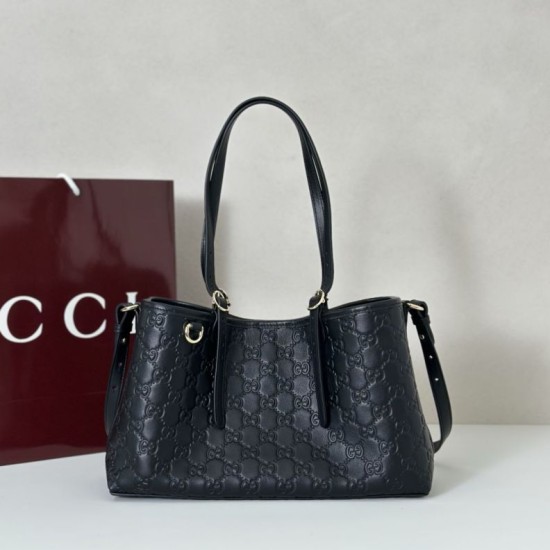 Borsa a tracolla piccola Gucci GG Emblem 847281 Marrone