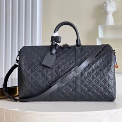 Qualità Specchio Replica LV Keepall Bandouliere 50 Borsa Taurillon Monogram M59025 Riproduzione Fedele LV Keepall Bandouliere 50 Borsa Taurillon Monogram M59025 imitazioni