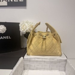 Replica Chanel AS5293, borsa a secchiello con coulisse piccola Hobo Vintage, pelle di daino gialla Imitazioni Replica qualità specchio Chanel AS5293, borsa a secchiello con coulisse piccola Hobo Vintage, pelle di daino gialla