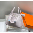 Borse Replica Alta Qualità Hermes Lindy 26 cm viola chiaro con finiture dorate Borse Replica Alta Qualità Hermes Lindy 26 cm viola chiaro con finiture dorate