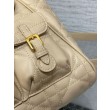 Zaino medio Dior Caro in pelle di agnello macrocannage beige