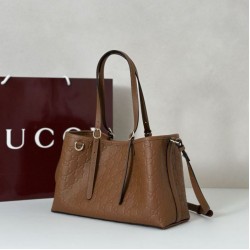 Replica Borsa tote media Gucci 815214 GG Emblem pelle goffrata marrone Imitazioni Replica qualità specchio Borsa tote media Gucci 815214 GG Emblem pelle goffrata marrone