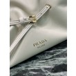 Borsa a spalla Prada Dada piccola in nappa beige