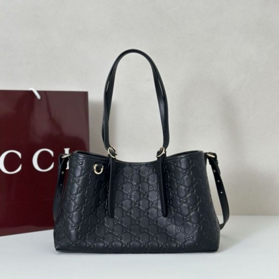 Borse Replica tote media Gucci 815214 GG Emblem pelle goffrata nera